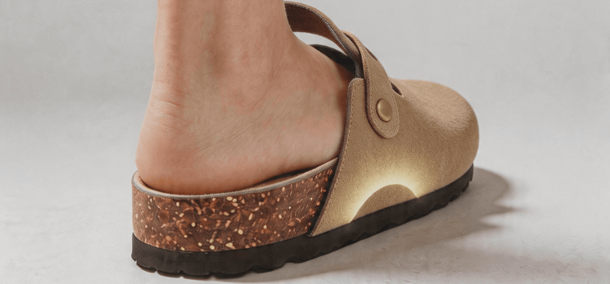 Heel cup and cork footbed supporting the foot